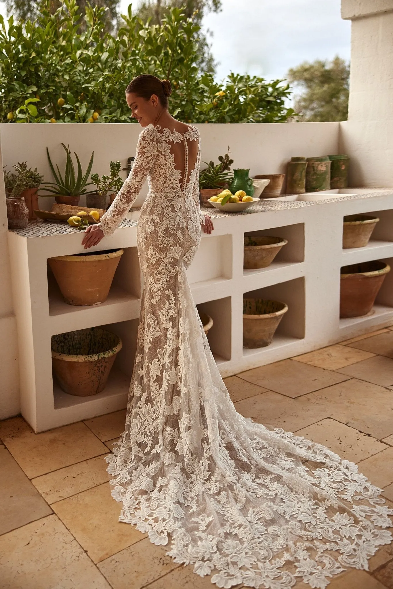 Sophisticated Lace Mermaid Wedding Gown with Deep V-Neck and Long Sleeves Plus Size