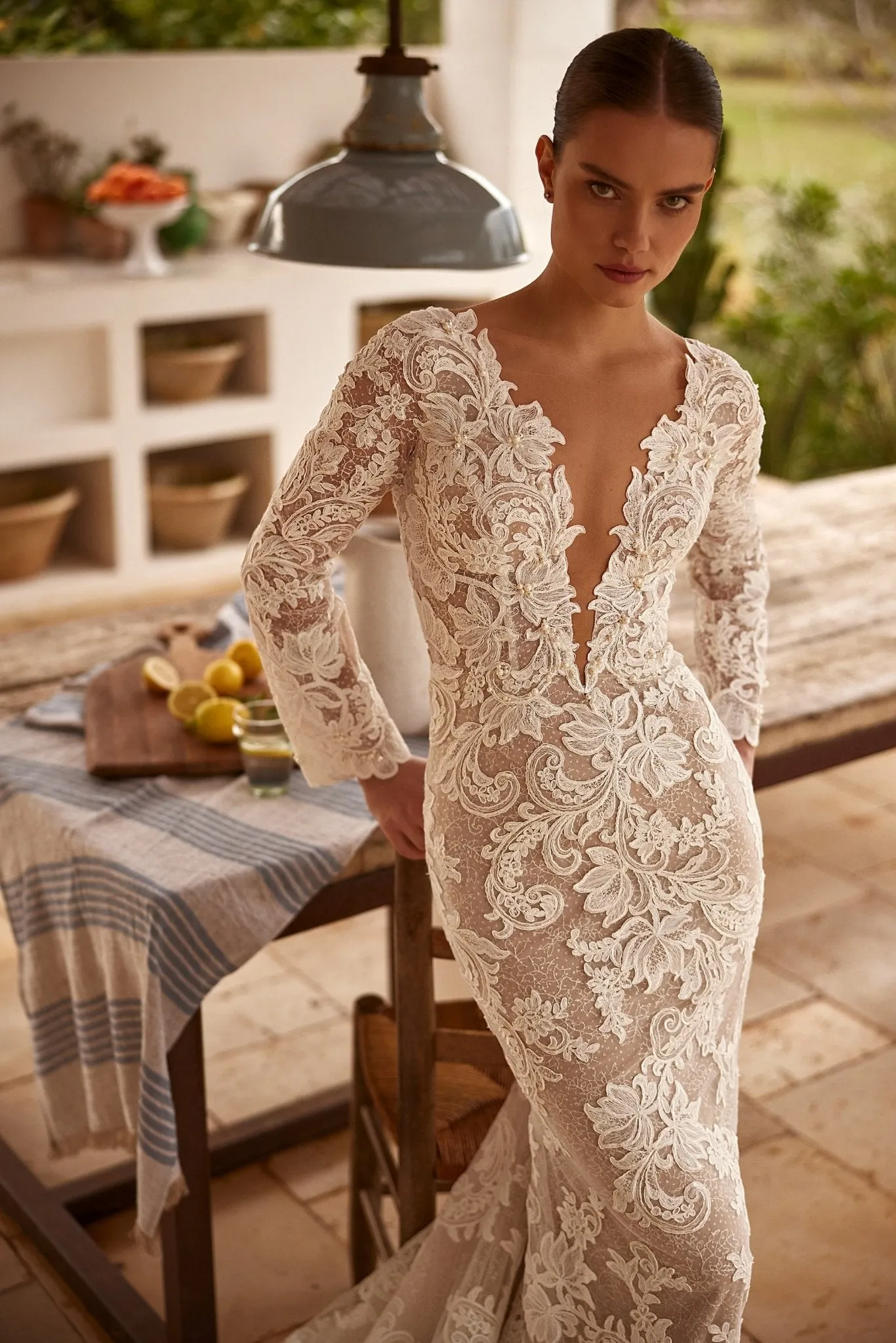 Sophisticated Lace Mermaid Wedding Gown with Deep V-Neck and Long Sleeves Plus Size