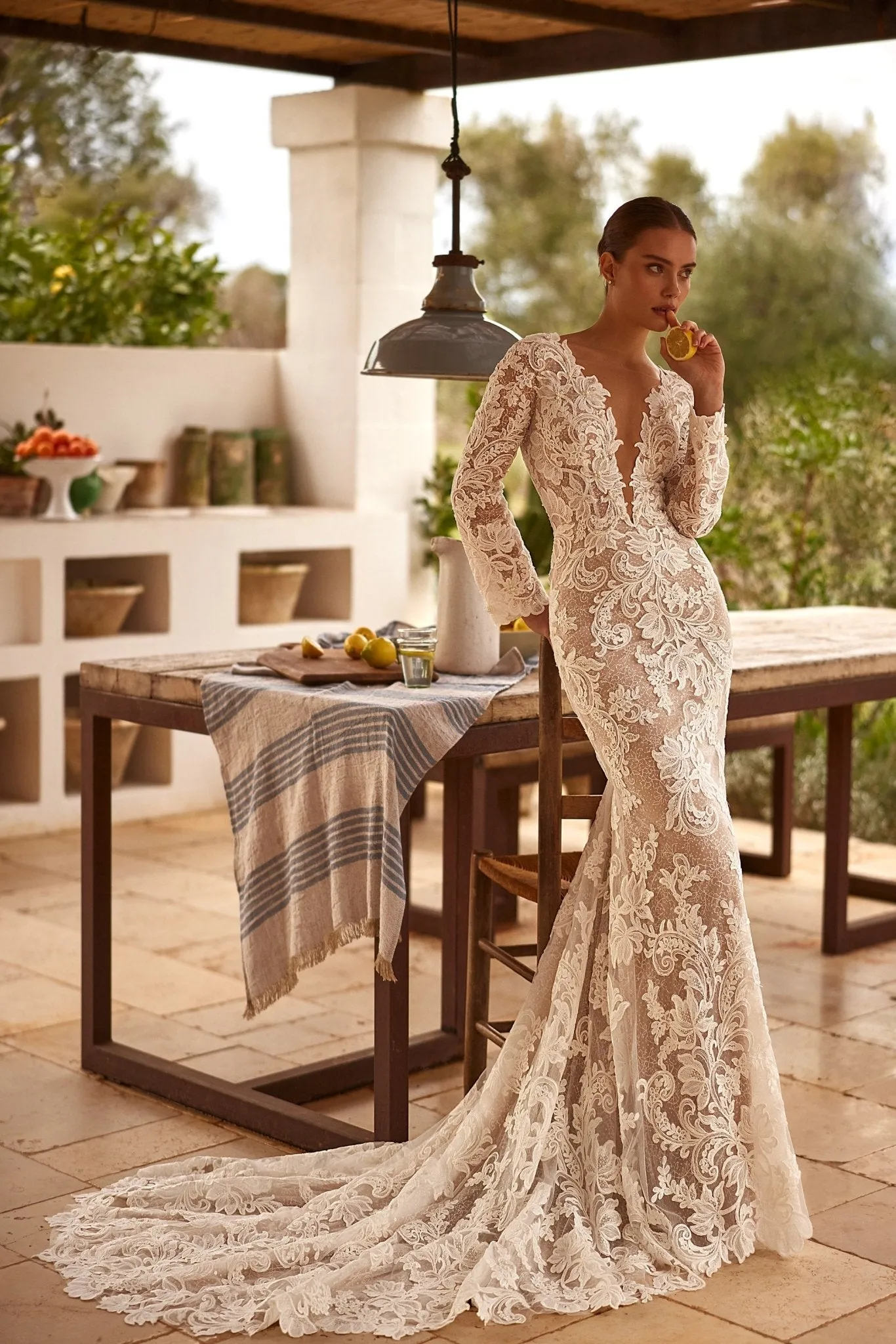 Sophisticated Lace Mermaid Wedding Gown with Deep V-Neck and Long Sleeves Plus Size